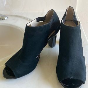 Black heeled open toe boots